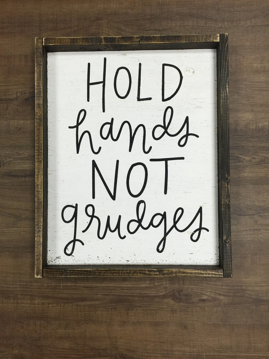 Hold Hands Not Grudges
