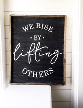 We Rise By Lifting Others- Wood Sign