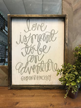 love-is-meant-to-be-an-adventure-wood-sign